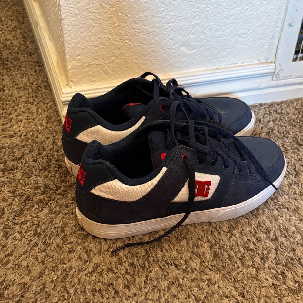 DC Men's Black, White, and Red Sneakers